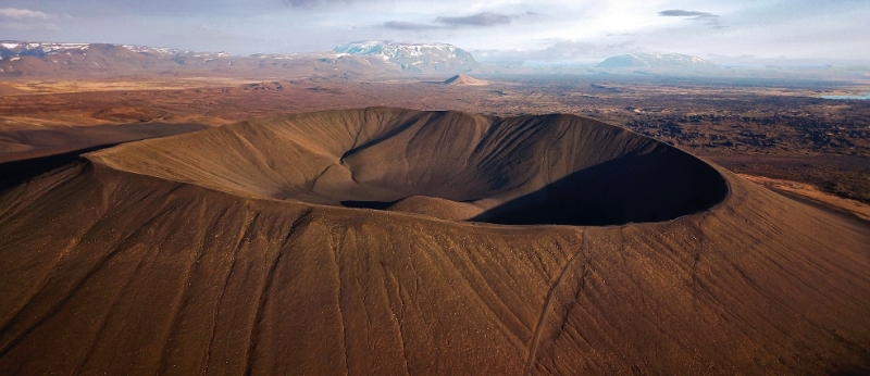 Left &ndash; Aerial view of Hverfjall crater. Right &ndash; Northern Lights, M&yacute;vatn, Iceland. Photo Credit: Bee Breeders
